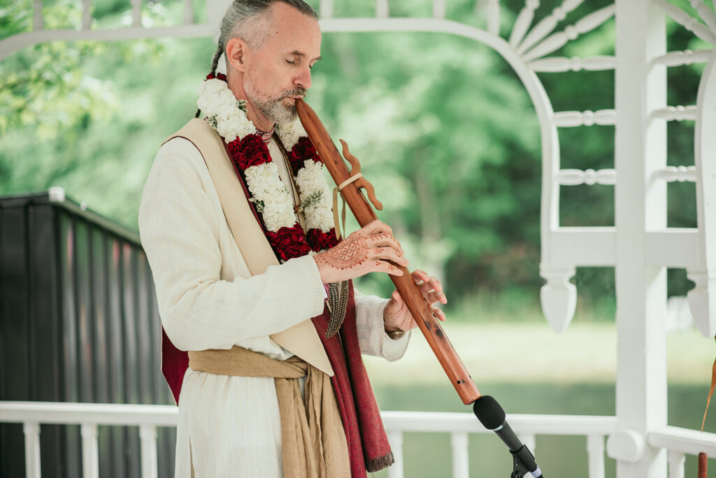 Traveling wedding ceremony from the island gazebo with a tribute to Air