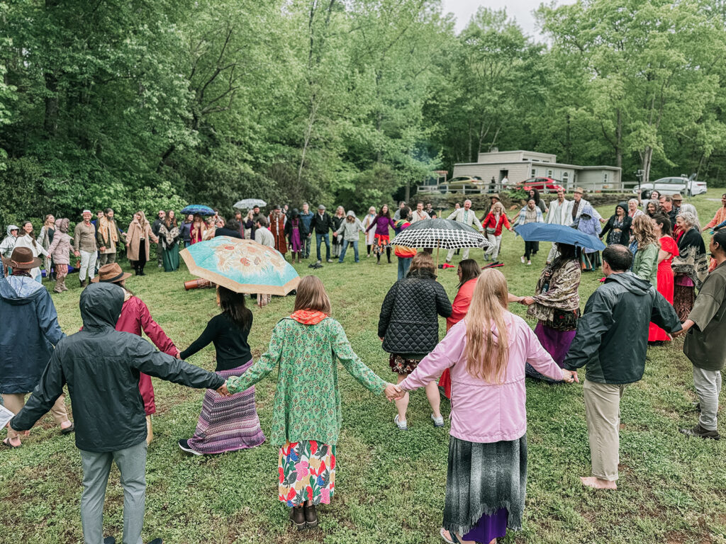 Honoring earth wedding ceremony moving ceremony at Ballinger Bridge rainy day Wedding
