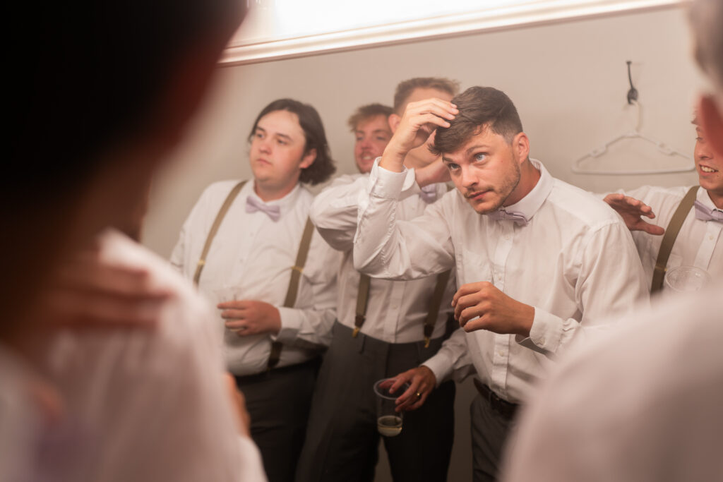 Greenville wedding
Spartanburg Wedding
Upstate South Carolina Wedding
Grooms suite
Groom fixing his hair
Groom looking in mirror