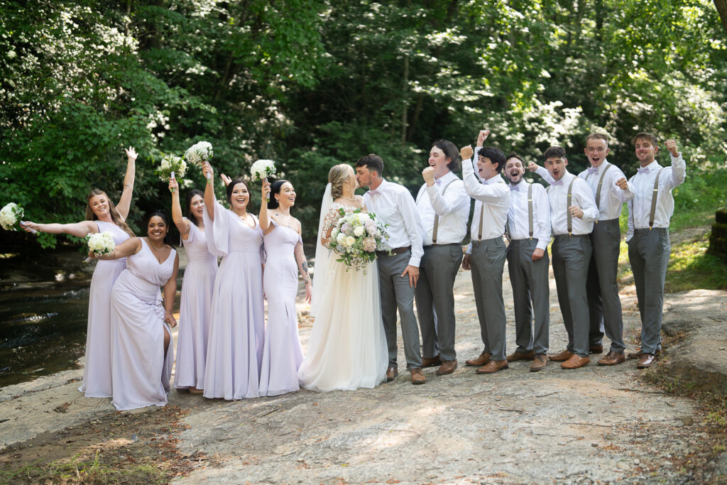 Celebration photo of entire wedding party in a wedding venue in Greenville South Carolina