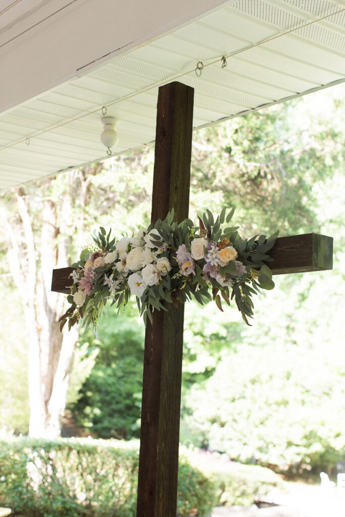 Christian arch and outdoor wedding venue