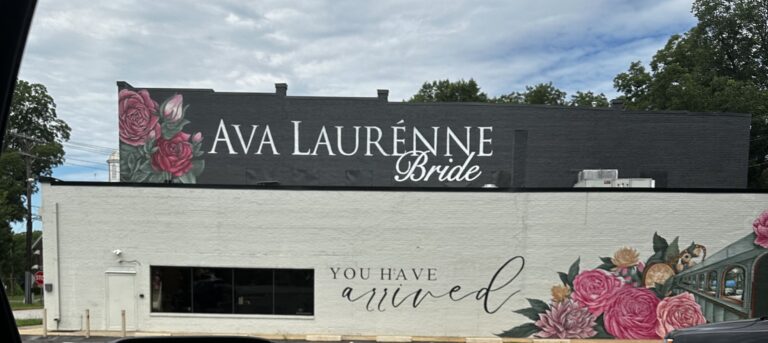 A bridal shop displays a huge mural and business sign in Greenville South Carolina
