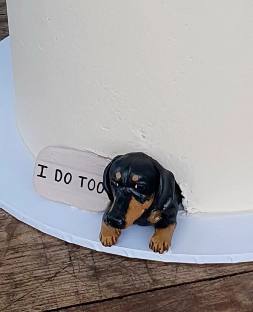 Personalized dog wedding cake decoration had a pet friendly wedding Greenville South Carolina