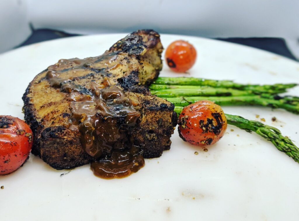 Grilled pork chop and roasted vegetables best catering upstate South Carolina