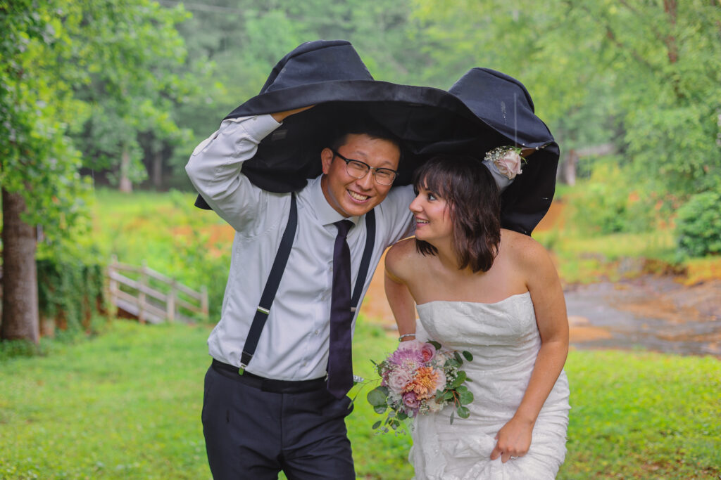 A couple elopes in the rain outdoor elopement ceremony near Greenville South Carolina