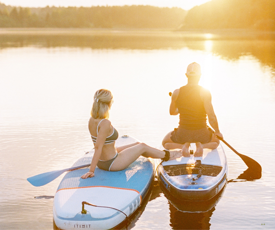 Paris Mountain State Park engaged couples fishing together on the water days before their Greenville South Carolina Wedding Venue