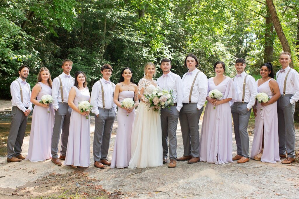 Elegant wedding party posing for wedding photos at a Greenville SC wedding venue