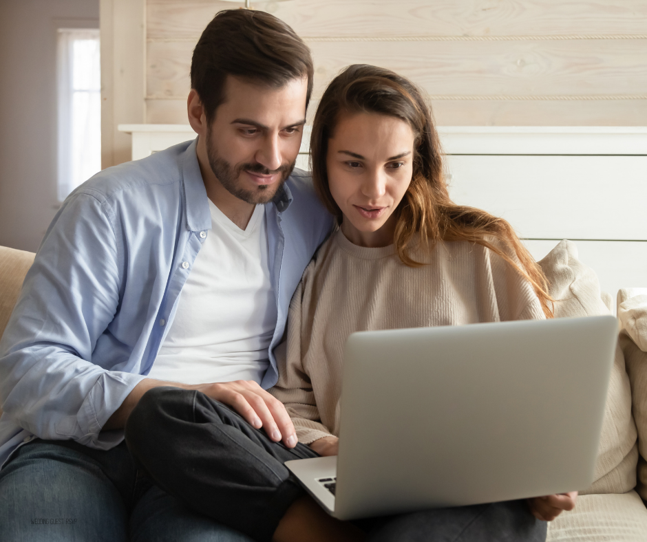 Engaged couple planning their wedding by using the Ballenger Bridge SC wedding venues Wedding Guest Portal RSVP system