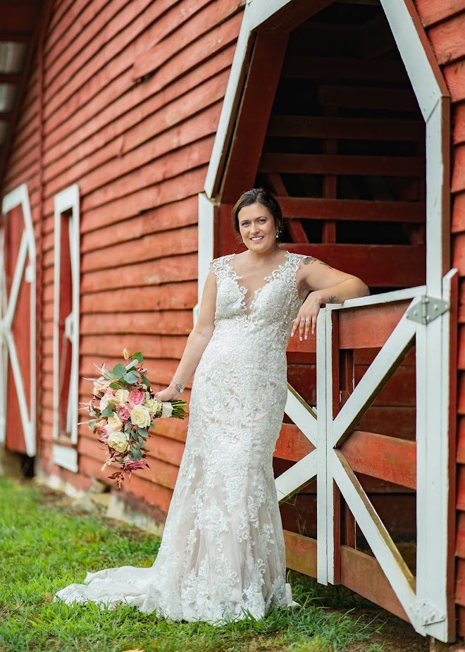 Our beautiful bride posing for wedding day photos at our garden wedding venue, riverfront wedding venue near Greenville South Carolina.